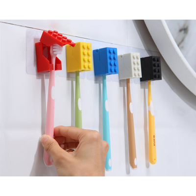 Seamless wall-mounted building block toothbrush holder Flip U-shaped slot toothbrush storage rack Children's building block toothbrush dust-proof rack Hanger Seamless adhesive Nail-free Drill-free Simple fashion Lifestyle